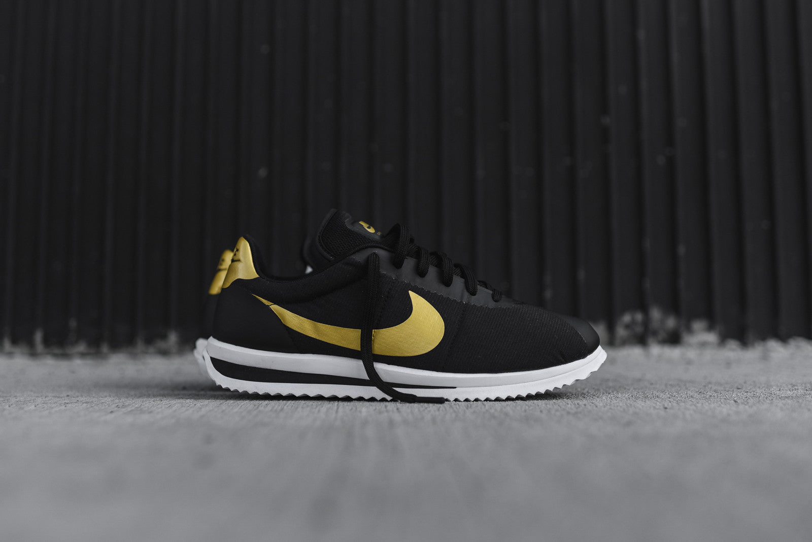 Nike Cortez Ultra QS - Black / Gold
