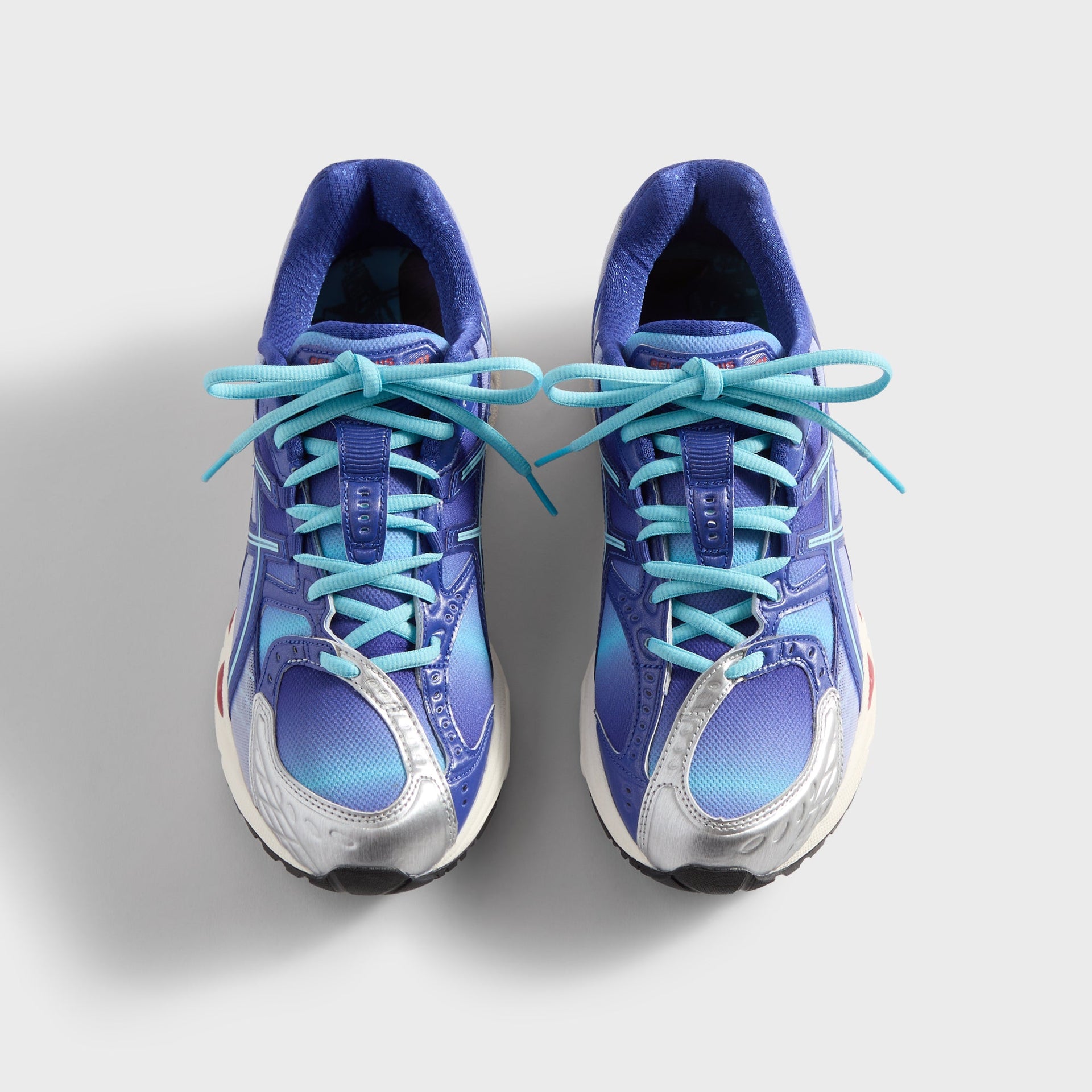 Marvel vs. Capcom | Kith for ASICS Gel-Nimbus 10.1 Iron Man vs. Mega Man Double Box - Italian Straw / Molten Lava / Mazarine Blue