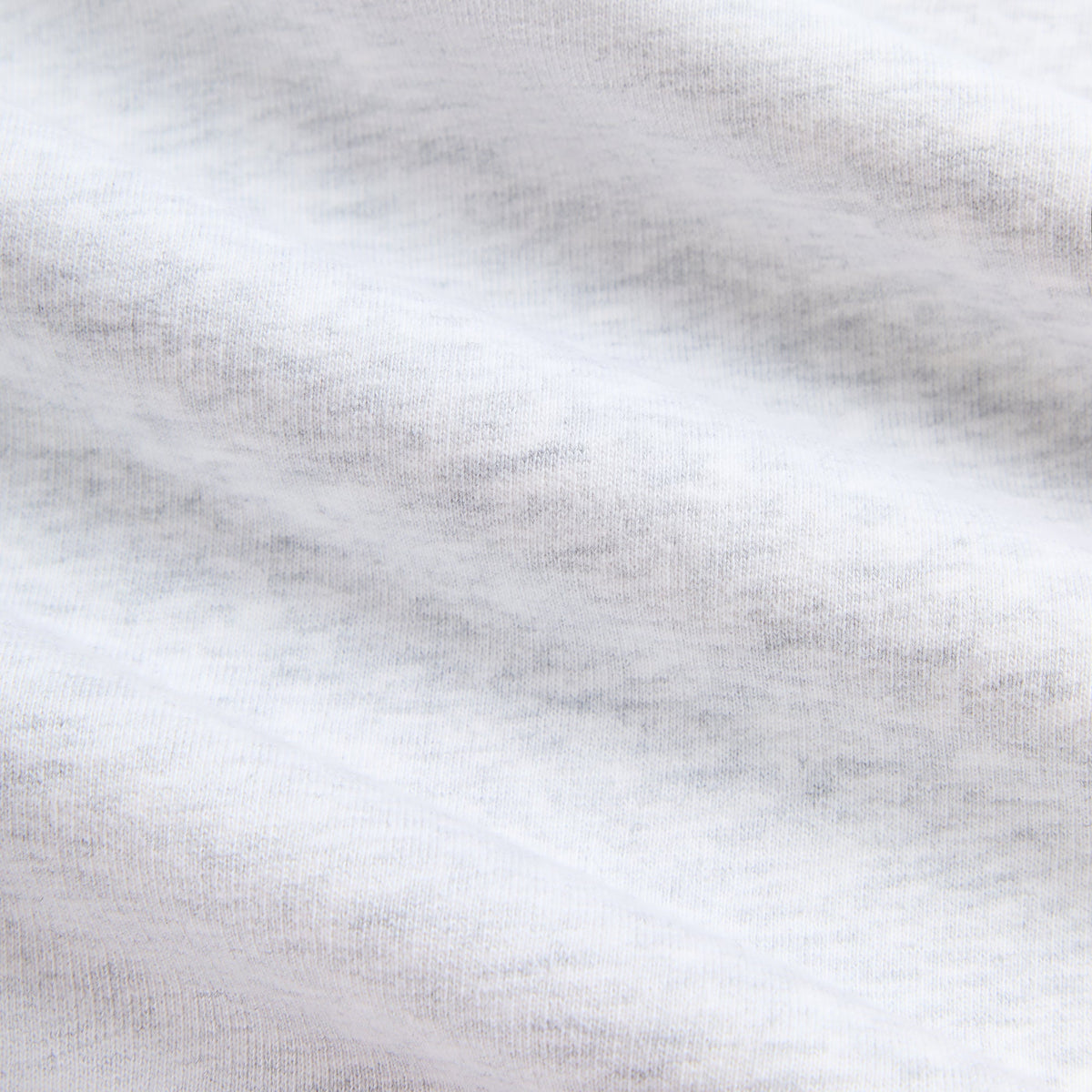 Close-up of light heather grey thermal fleece fabric of the Kith Williams II hoodie