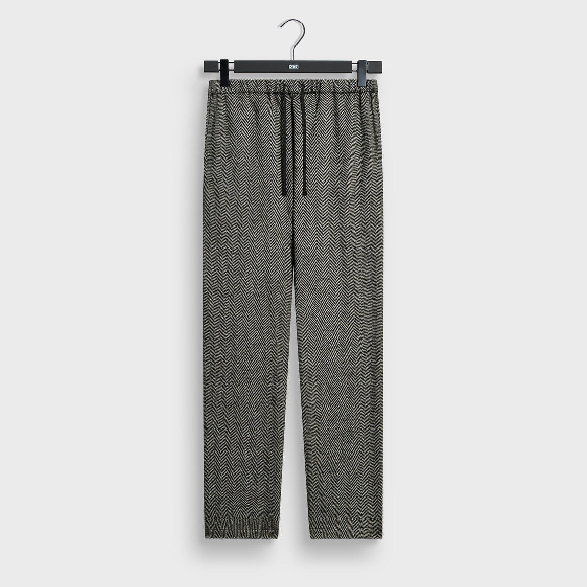 Kith Chenille Herringbone Grayson Pant in black and cream herringbone, front view, drawstring trousers