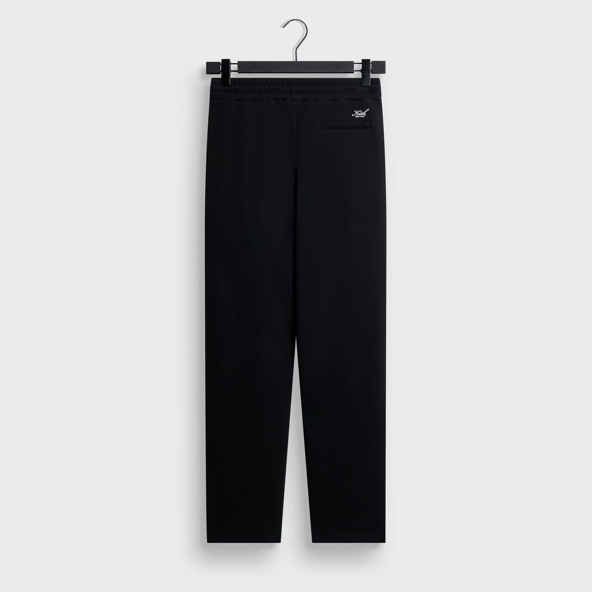 Kith Bryson Sweatpant in black, back view, with welt pocket and cuffed hems