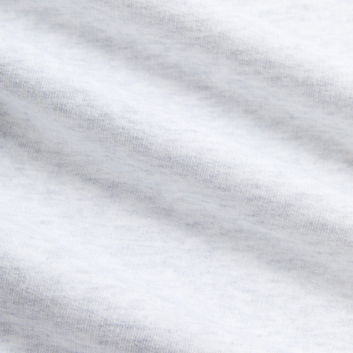 Close-up of light heather grey fleece fabric of the Kith Bryson sweatpant