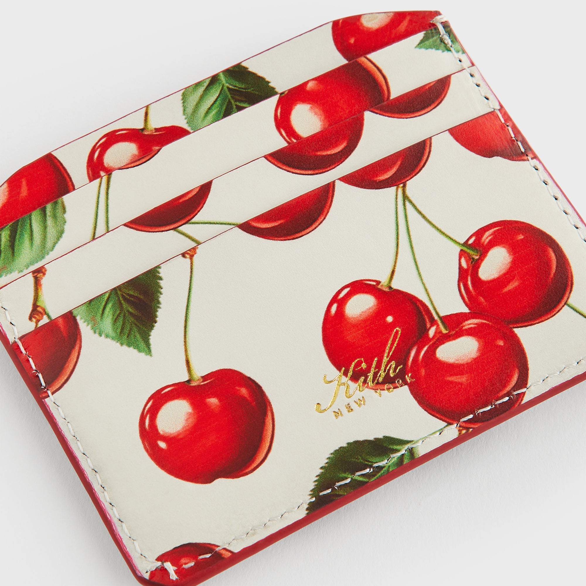 Kith Women Tossed Cherries Notch 6CC Card Case - Sandrift – Kith UK